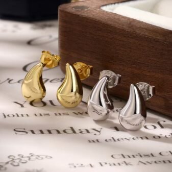 “Teardrop - Shaped Stud Earrings: Gold & Silver Tone Styles”